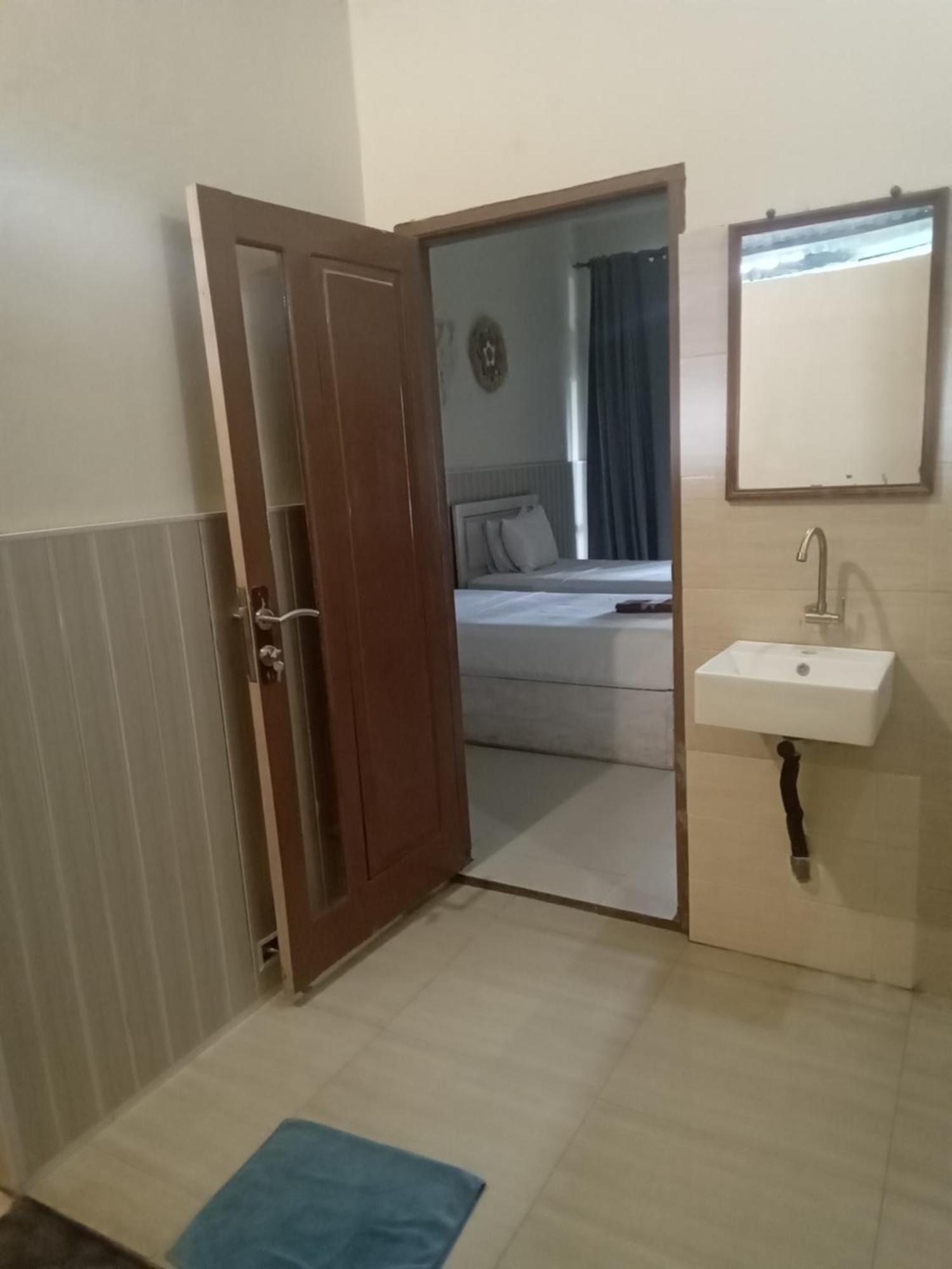 Wisma Bunda Джили Трауанган Стая снимка